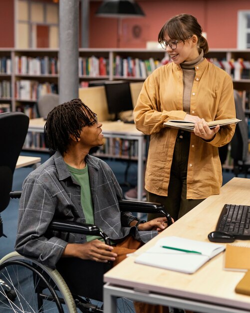 Colleagues studying in the university library