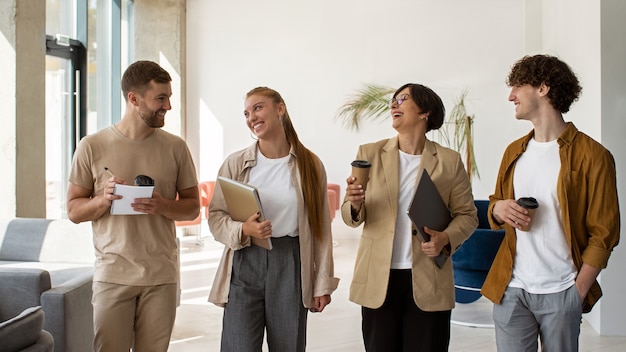 Colleagues with coffee cup front view