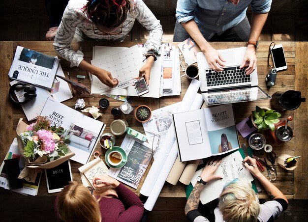 Colleagues working at a desk 