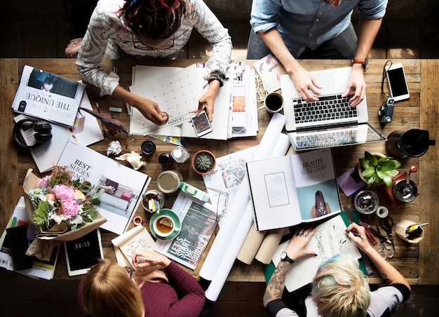 Colleagues working at a desk 