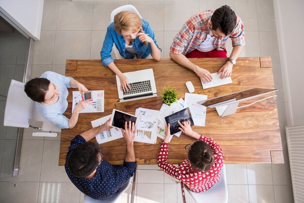 Colleagues working at office in relaxed atmosphere