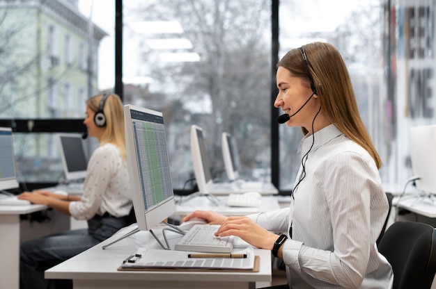 Colleagues working together in a call center office