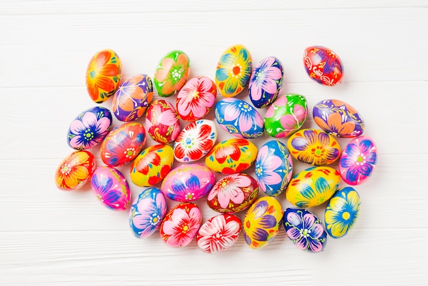 Collection of colored eggs on board