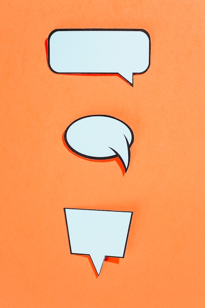 Free photo collection of comic style speech bubbles on an orange background