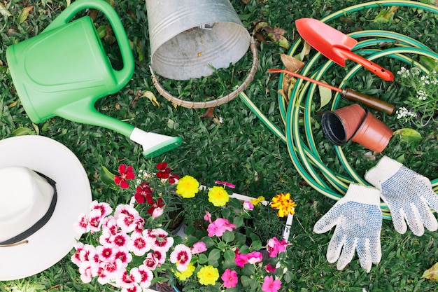 Collection of gardening equipment on grass