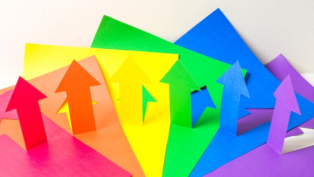 Collection of paper arrows in LGBT colors