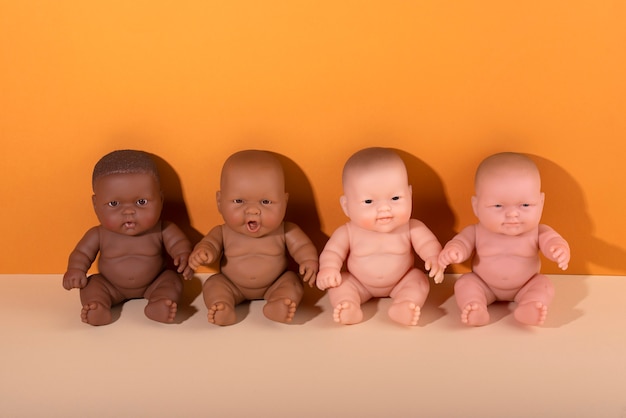 Collection of plastic baby dolls for children with diverse skin colors