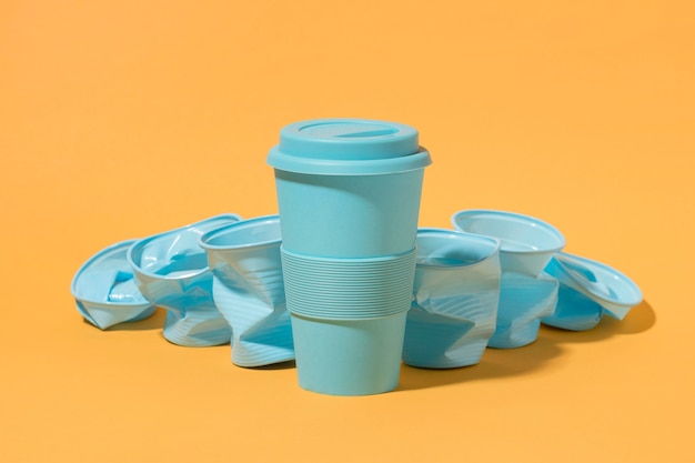 Collection of plastic cups with copy space