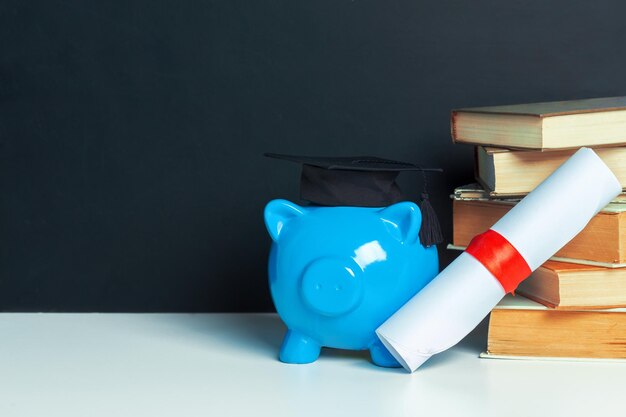 College graduate student diploma piggy bank
