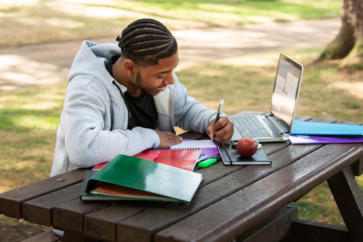 Free Photo college students cramming outdoor