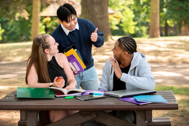 Free photo college students cramming outdoor