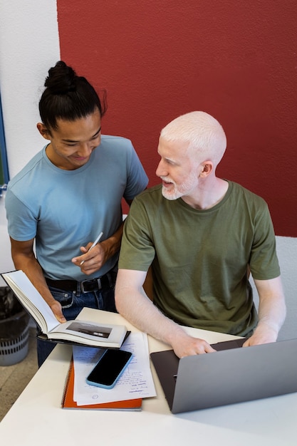 Free photo college students of different ethnicities cramming