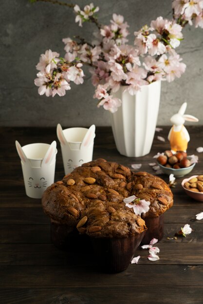 Colomba with almonds and flowers high angle