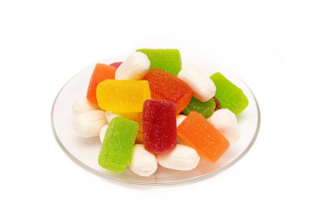 Color chewing candies on a white background