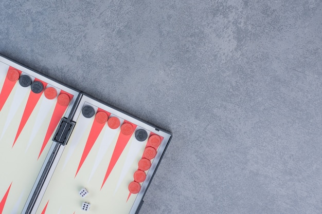 Free photo color detail of a backgammon game with two dice close up.