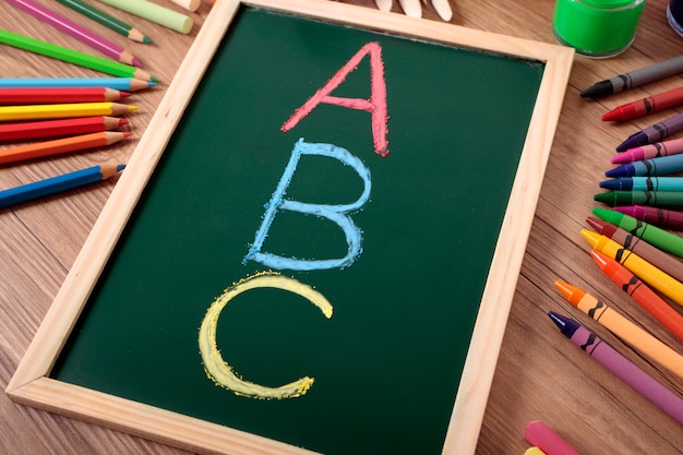 Free photo colored abc on a small blackboard