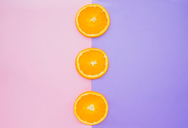 Colored background with orange slices