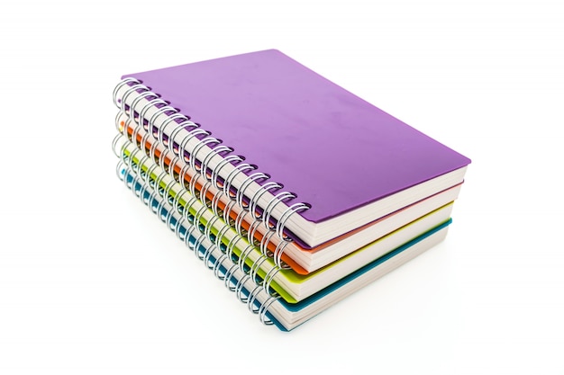 Colored notebooks piled up