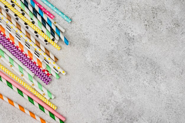 Colored paper straws copy space