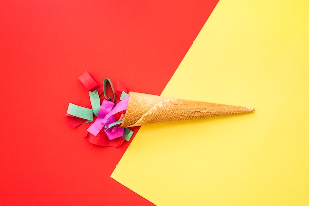 Colored surface with streamer and ice cream cone