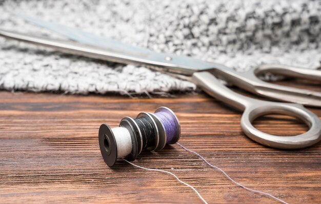 Colored thread spools with scissors