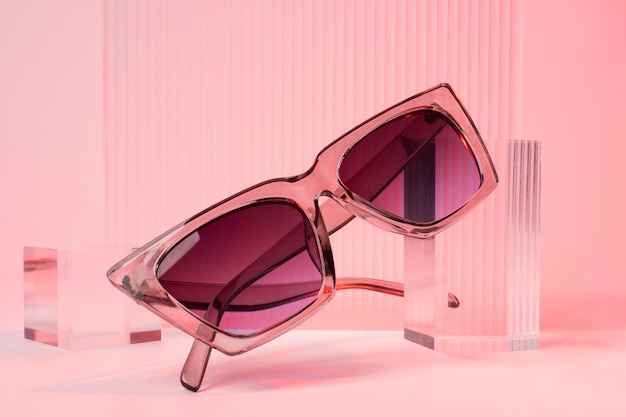 Free photo colored transparent sunglasses  still life