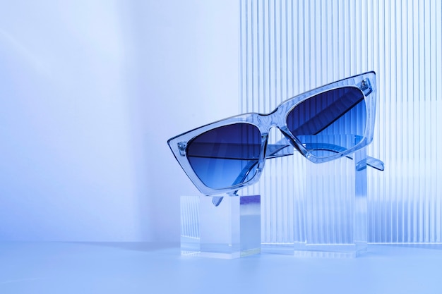 Free photo colored transparent sunglasses  still life