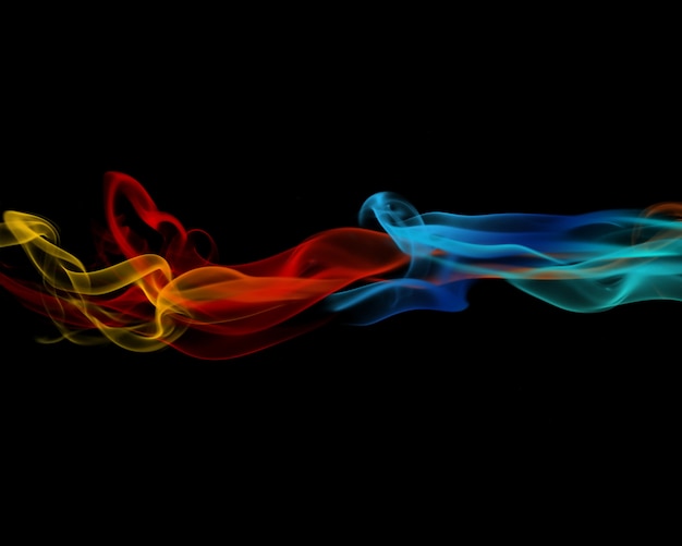 Free photo colorful abstract smoke on black background