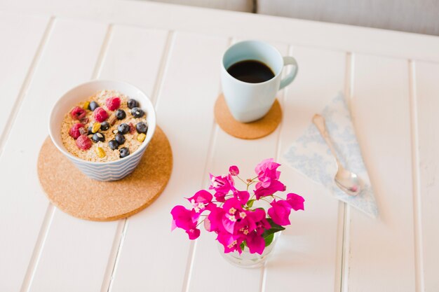 Colorful arrangement of granola and flowers