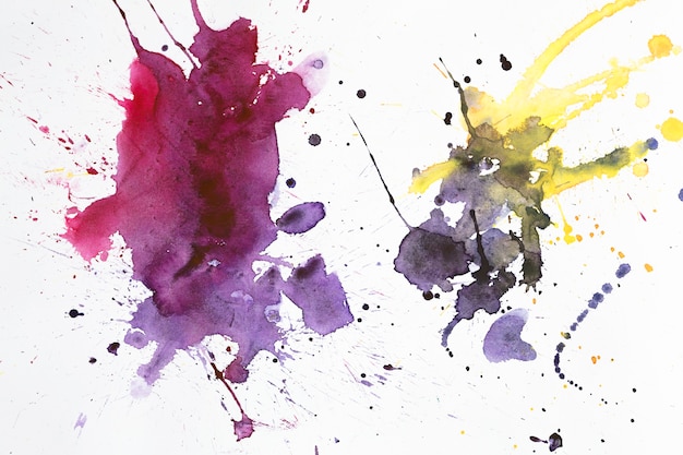 Free photo colorful artistic stains of watercolor splashes