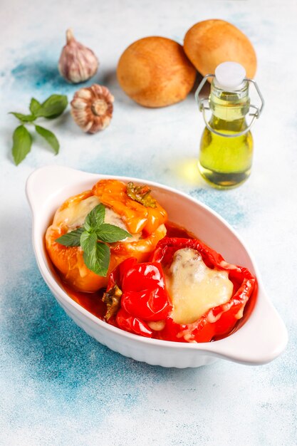 Colorful baked with cheese, stuffed peppers with minced meat.