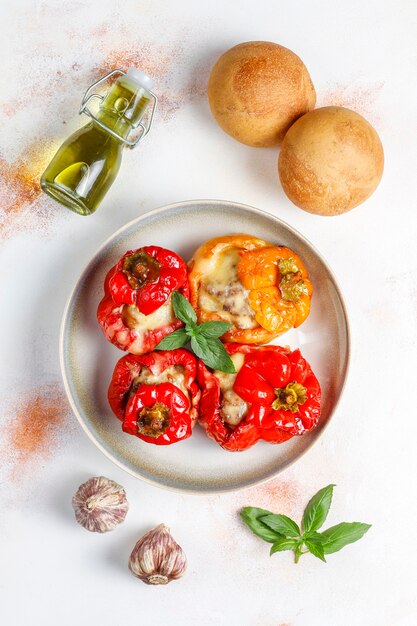 Colorful baked with cheese, stuffed peppers with minced meat.