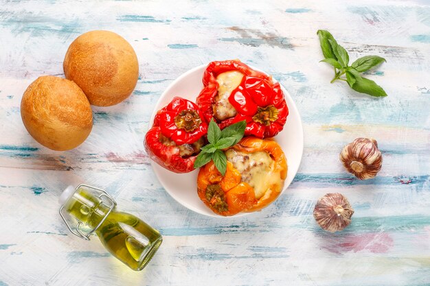 Colorful baked with cheese, stuffed peppers with minced meat.