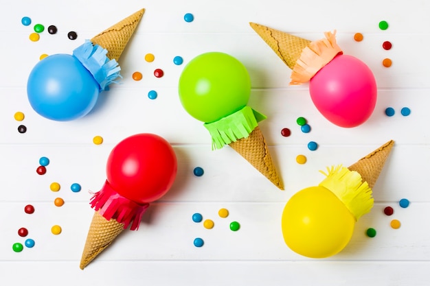 Colorful balloons ice cream on white background