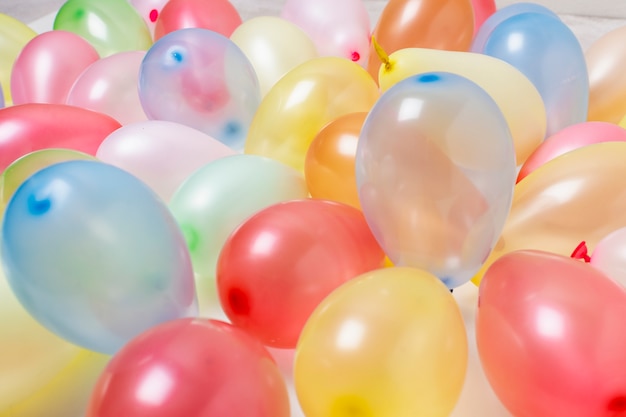 Colorful birthday balloons close-up background