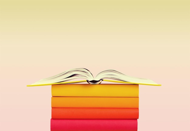 Premium Photo | Colorful books collection on background.