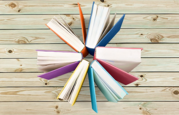 Premium Photo | Colorful books collection on background.