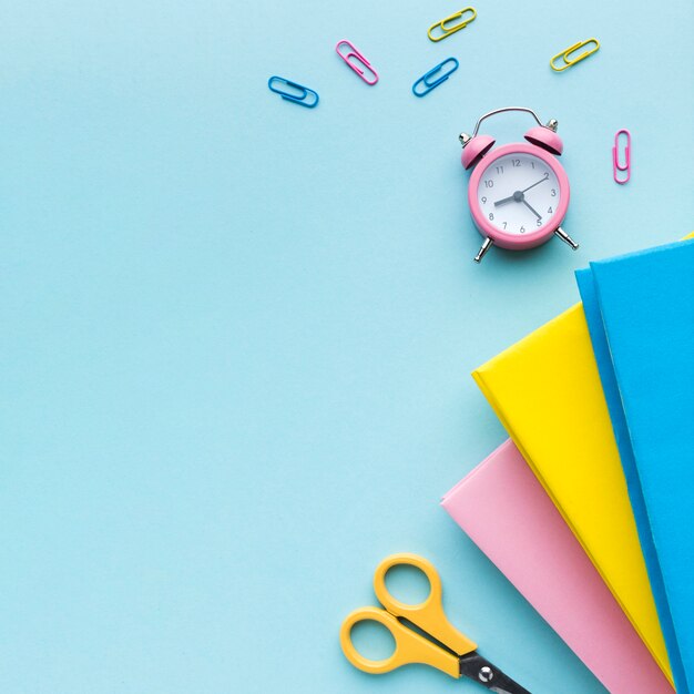 Colorful books and paper clips