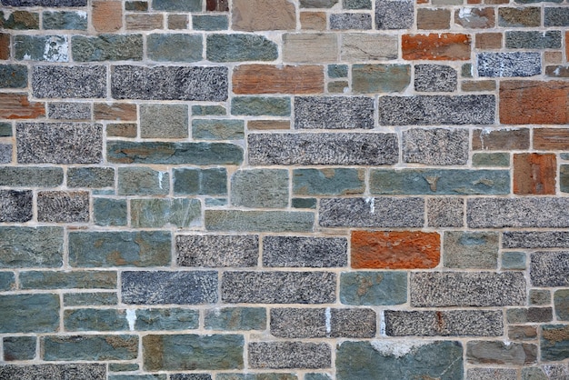 Colorful brick wall background from old building in Quebec City