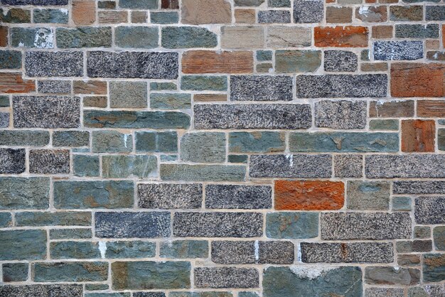 Colorful brick wall background from old building in Quebec City