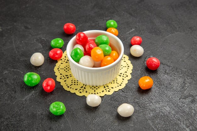 colorful candies on dark