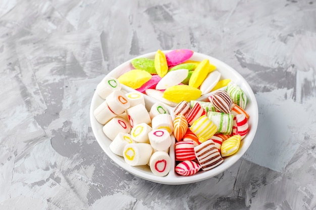 Colorful candies, jelly and marmalade, unhealthy sweets.