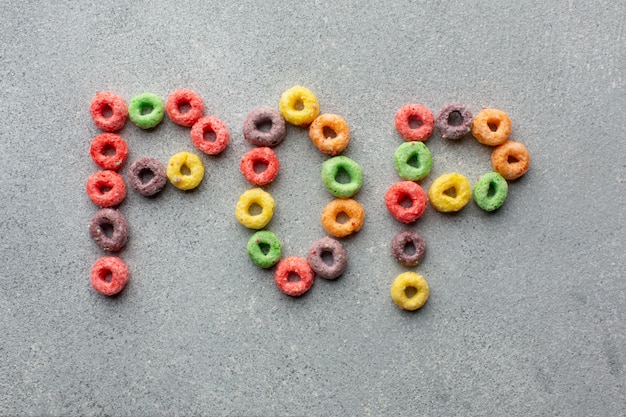 Free photo colorful cereal pop concept on a table