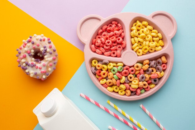 Colorful cereal tray and doughnut