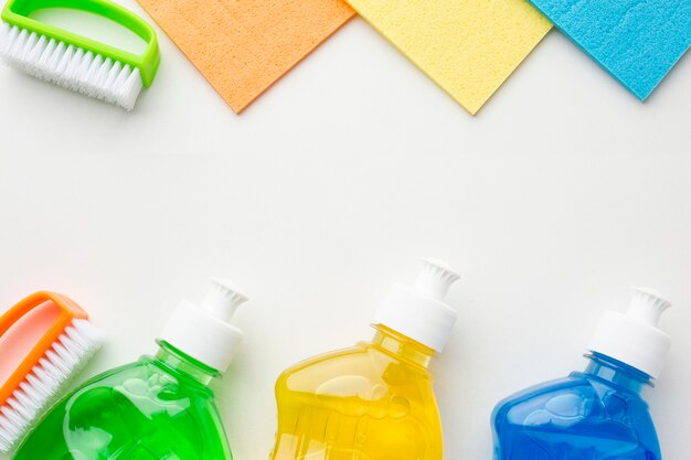 Colorful cleaning products copy space