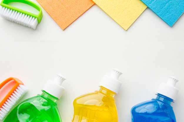 Colorful cleaning products copy space