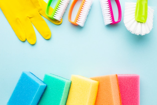 Colorful cleaning products copy space