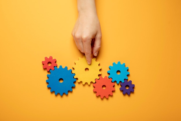 Free photo colorful cogwheels arrangement top view