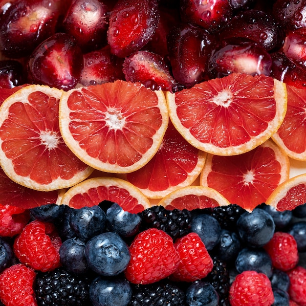 Colorful collage of fruits texture close up