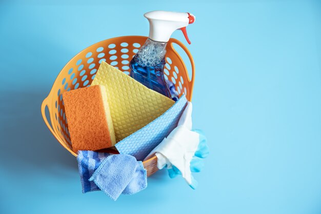 Colorful composition with sponges, rags, gloves and detergent for cleaning close up. Cleaning service concept.